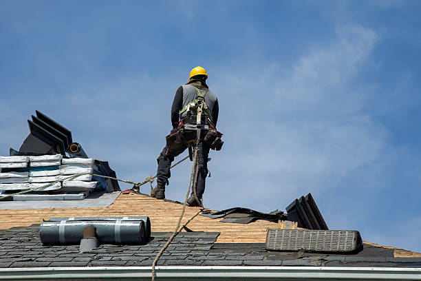 Professional Roofing technician working in Kingsley, MI
